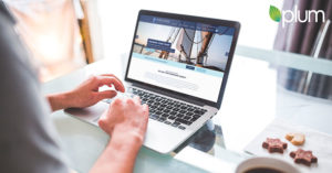 Financial advisor browsing marketing strategies on a laptop, illustrating 10 digital marketing ideas for financial advisors in 2025.