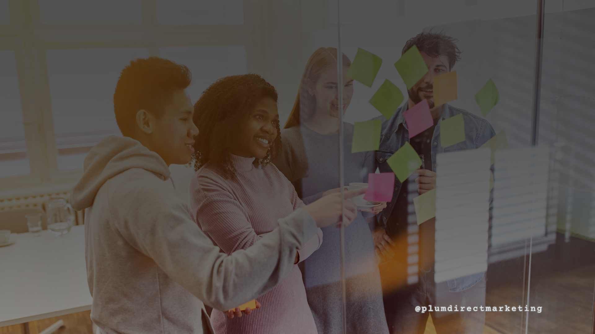 Realtor leading an educational real estate workshop for home buyers and sellers, with attendees engaged in a community event setting