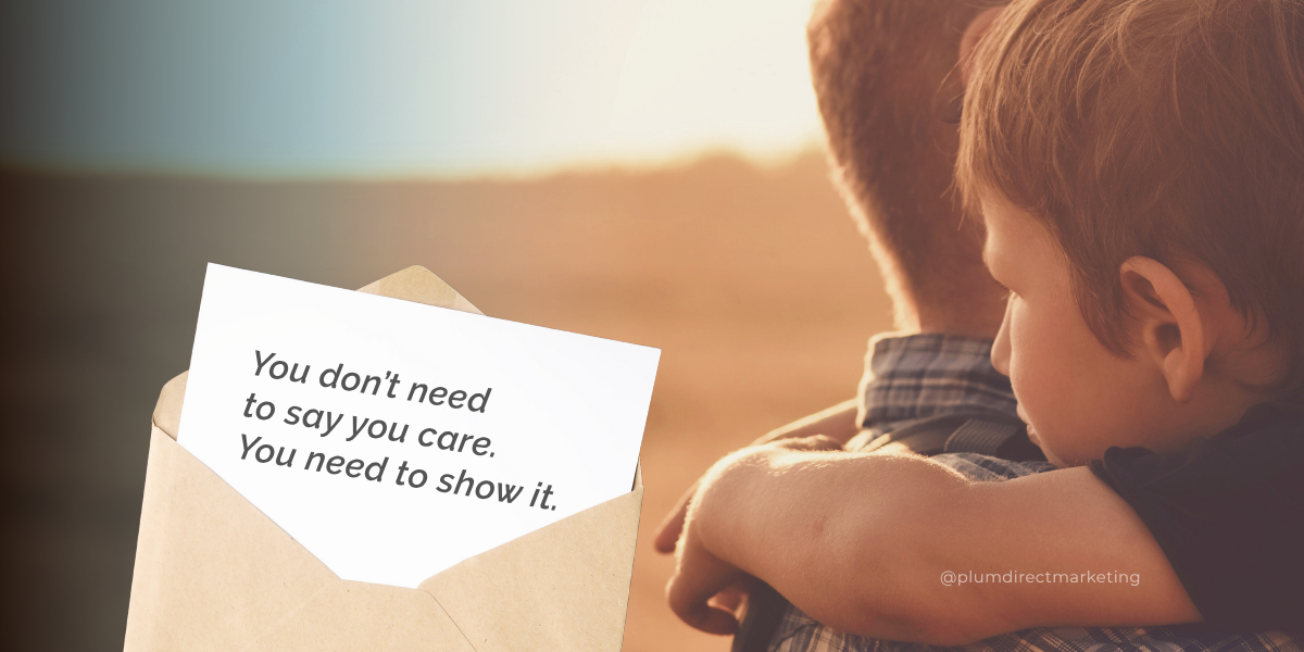 Father hugging son with a card that reads “You don’t need to say you care. You need to show it.” A reminder that great financial marketing strategies lead through actions, not words.
